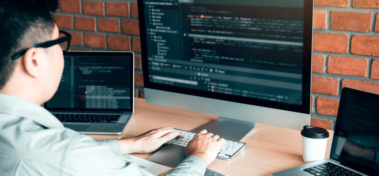 man working on web development